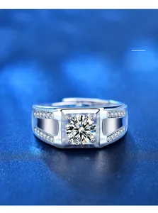 Detail of 0.03 silver plated men's ring with a brilliant round moissanite in four-prong setting