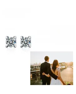 Detailed close-up of sparkling moissanite stud earrings in a classic four-prong silver setting