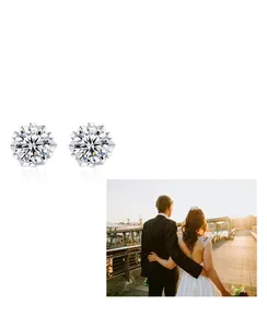Close-up of moissanite silver stud earrings with multi-claw setting for brilliant sparkle