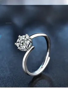 Macro view of 925 silver moissanite ring with six-prong setting and 3EX hearts and arrows cut