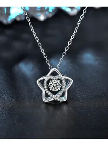 Detail of S925 sterling silver necklace with star and heart moissanite pendant