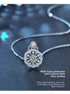 Detailed macro of S925 silver cherry blossom pendant with moissanite and hollow petals