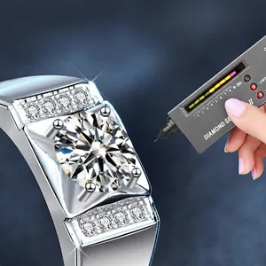 Men's 925 silver moissanite wedding ring with classic four-prong setting and side accents