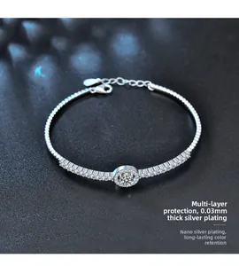 Macro detail of a 925 sterling silver bracelet showing the clasp and sparkling centerpiece