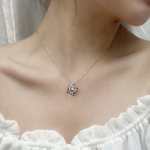 S925 sterling silver pentagram necklace with dancing heart moissanite pendant on model