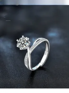 Detail of 925 sterling silver ring with six-prong moissanite and 3EX cut diamond sparkle