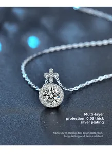 Macro shot of 925 silver clover necklace pendant with nano silver plating and moissanite stones