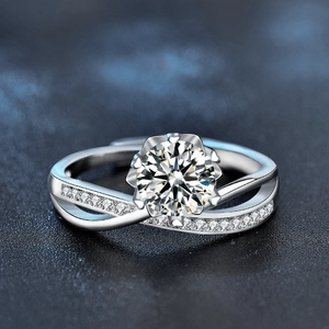 925 silver moissanite ring with six-prong setting and intertwined diamond-set band