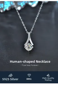 Macro view of S925 silver necklace with 1-carat moissanite pendant on a dark background