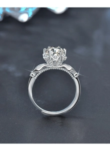 Detail of adjustable 925 silver ring featuring moissanite with crown six-prong setting