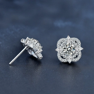 925 sterling silver four-leaf clover stud earrings featuring brilliant moissanite stones
