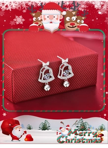 Detailed view of sterling silver Christmas bell earrings with bright round-cut stones