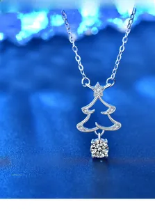 Macro view of Christmas tree sterling silver pendant with Moissanite stone and 3EX cut detail