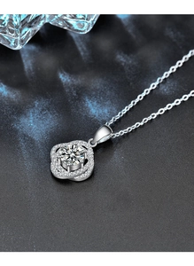 Close-up of S925 silver rose necklace with a brilliant moissanite center stone