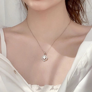 Rose gold S925 sterling silver rose necklace with moissanite pendant on a model