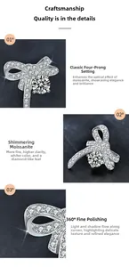 Detailed view of moissanite bow ring with four-prong setting and polished silver finish