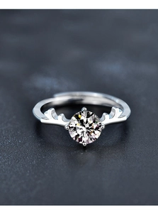 Macro shot of 925 sterling silver reindeer antler ring with round moissanite gemstone