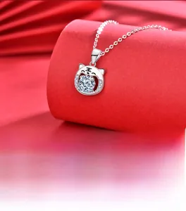 Macro detail of S925 silver tiger pendant with round moissanite and thick silver plating