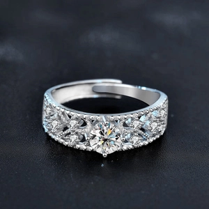 Adjustable 925 sterling silver moissanite ring with hollow filigree and pavé accents