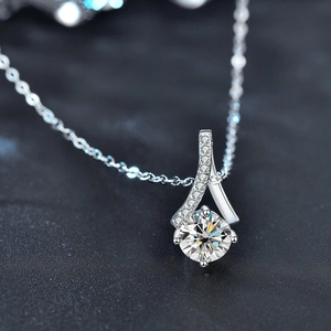 925 silver necklace with sparkling 1 carat round moissanite in crisscross pendant