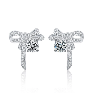 Elegant 925 silver bow stud earrings with sparkling moissanite stones on white background