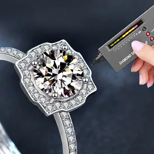 S925 silver ring featuring 1ct moissanite with four-prong setting and halo accent