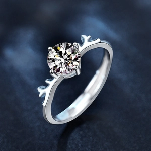 925 Sterling Silver Moissanite ring featuring a creative deer antler design on a blue backdrop