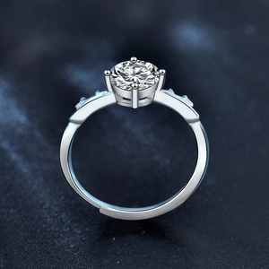 Elegant 925 sterling silver deer antler ring with round moissanite on starry background