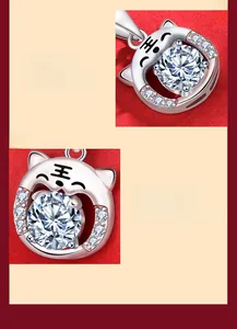 Detail of S925 silver tiger pendant featuring a brilliant-cut moissanite stone