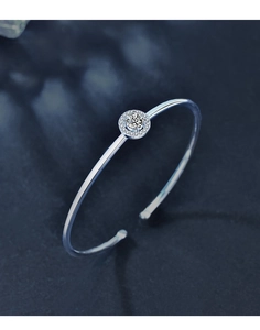 Detailed view of 925 sterling silver bangle featuring a round moissanite centerpiece