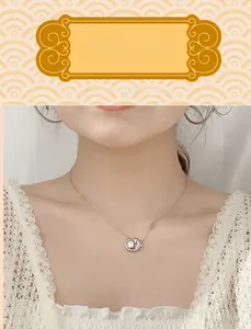 Elegant 925 sterling silver koi fish pendant necklace worn over a white lace top