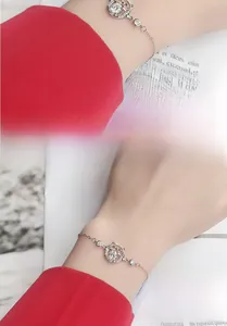 Detail of S925 sterling silver lucky cat bracelet with sparkling moissanite stone