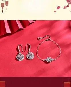 Macro view of 925 sterling silver jewelry set featuring ancient coin motif and Moissanite