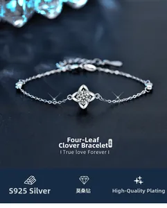 Macro detail of S925 sterling silver four-leaf clover bracelet with sparkling moissanite