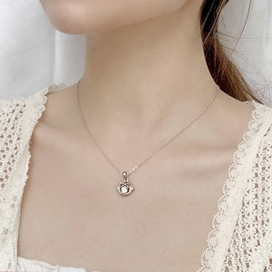 925 silver lucky cat pendant necklace with moissanite on model for Chinese New Year