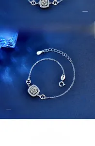 Detailed view of S925 sterling silver bracelet with H-logo and sparkling center stone