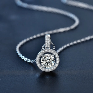 Classic Moissanite halo necklace in 925 sterling silver with a round brilliant pendant