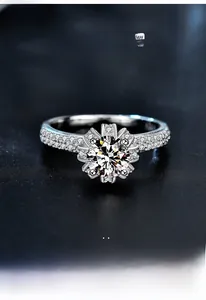 Close-up of S925 sterling silver moissanite ring with crown-shaped snowflake design