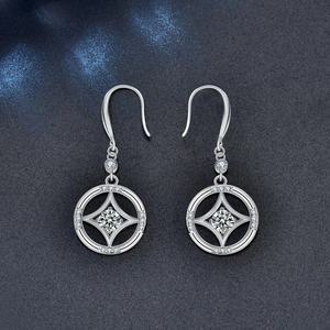 925 silver Chinese vintage drop earrings with starburst moissanite on black background