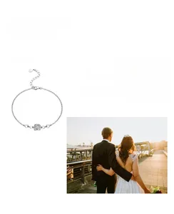 Detail of 925 sterling silver bracelet with 0.5 carat moissanite and heart accents