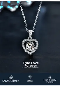 Macro shot of 925 silver heart pendant with moissanite on dark leather background