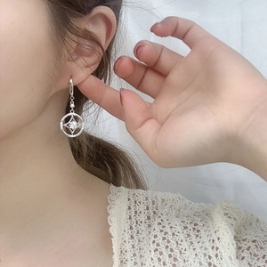 925 silver vintage earrings featuring a sparkling star pendant and pavé crystal hoop