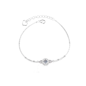 925 silver bracelet with hollow coin pendant and sparkling stone on white background