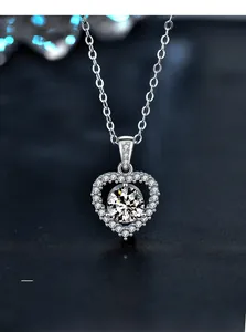 Macro detail of 925 silver heart necklace showing 3EX cut moissanite pendant