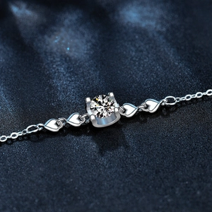 925 Sterling Silver Bracelet with heart links and a sparkling moissanite solitaire stone