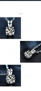 Close-up of moissanite pendant featuring classic four-prong setting and polished silver chain