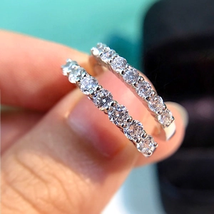 Pair of S925 sterling silver eternity rings with sparkling pavé cubic zirconia stones