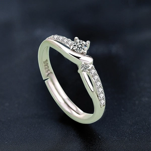 Detail of 925 sterling silver Mobius ring showing zircon inlay and S925 hallmark