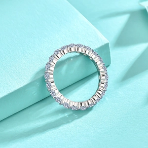 Macro shot of 925 silver eternity ring with sparkling full circle pavé cubic zirconia
