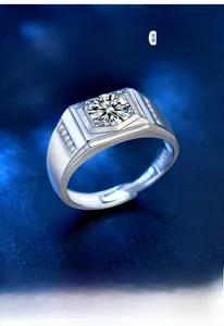 Macro detail of men's S925 silver moissanite ring with square setting and side diamonds